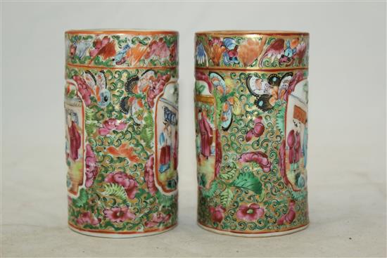 Pair of Chinese famille rose cylindrical brush pots, mid 19th century, 10.5cm., one cracked(-)